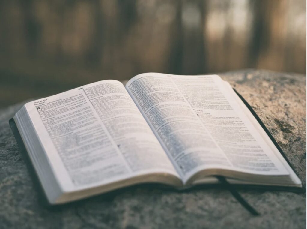 Picture of open Bible and Verses About Letting God Lead Your Life